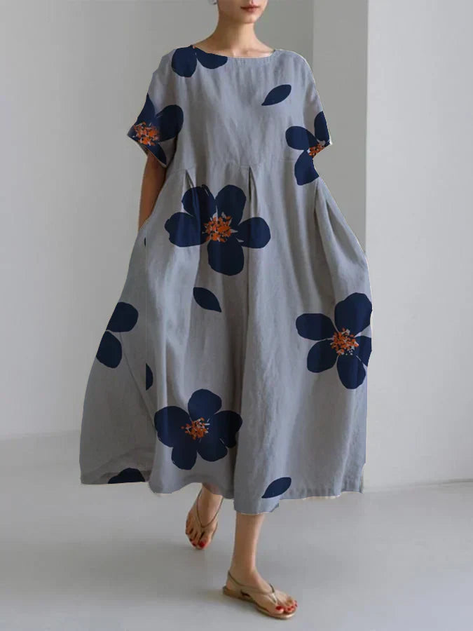 RAFFAELLA | Langes Blumenkleid mit lässigem Schnitt und eleganten Details für schicke Tage